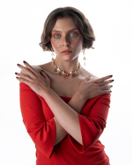 Luna di Seta Cappuccino set featuring mother of pearl stones, champagne Swarovski crystals, and a warm orange pendant on sterling silver