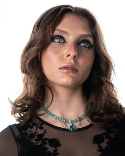 LunaSol Necklace featuring Tiffany cat-eye stones, a majestic blue Swarovski crystal, and a sterling silver moon and sun motif pendant
