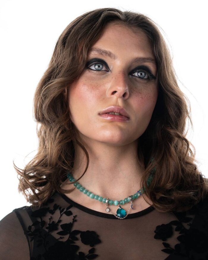 LunaSol Necklace featuring Tiffany cat-eye stones, a majestic blue Swarovski crystal, and a sterling silver moon and sun motif pendant