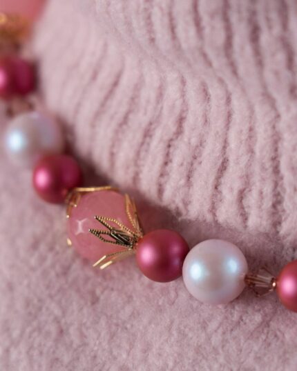 Rosé Necklace featuring natural pink jade stones, Swarovski crystals in rose and mulberry hues, and gold-tone plated craftsmanship