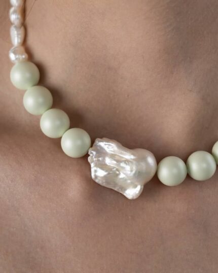 Verdelle Necklace featuring natural freshwater pearls, a pearl pendant, and Swarovski pastel green crystals