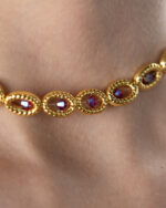 "Mika Necklace with golden hematite beads and Swarovski crystals, luxury jewelry for women, elegant and sparkling necklace for special occasions."
