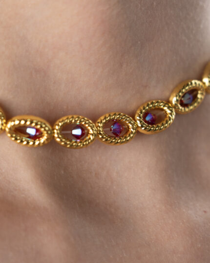 "Mika Necklace with golden hematite beads and Swarovski crystals, luxury jewelry for women, elegant and sparkling necklace for special occasions."